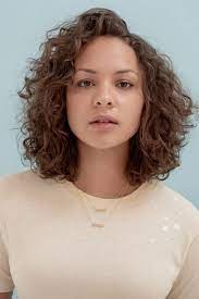 This Hamilton Star Has A Fashion Collab You Ll Want Every Item Jasmine Cephas Jones Curly Hair Styles Hairstyle