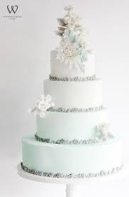 Featured Cake Winifred Kriste Cake Wonderful For Winter Four Tier Light Blue And Whit Disney Wedding Cake Winter Wedding Cake Winter Wonderland Wedding Cakes