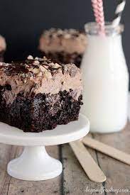 Sinful Triple Chocolate Poke Cake Chocolate Poke Cake Desserts Cake Recipes