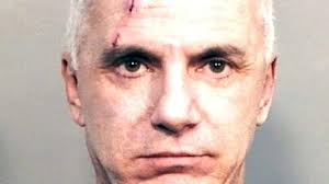 Man arrested after firing rifle out back door of Woodbury home