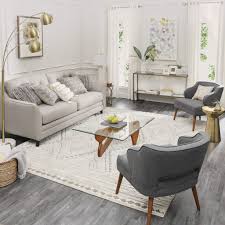 While the size of the area rug is important, the area rug placement is equally paramount. How To Arrange Furniture Around An Area Rug Mohawk Home