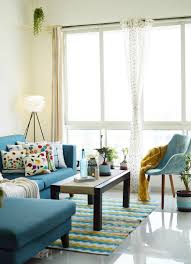Near Or Far This Mumbai Apartment Shows The Universal Delight Of Color Interior Design Living Room Interior Design Modern Architecture House