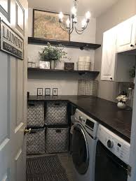 These laundry room ideas are full of practical storage solutions and organizing tips, which help you maximize your space, no matter how small. Basket Basket Basket Baskets Laundry Laundryroom Peel Stick Target Wallpap Elegant Laundry Room Dream Laundry Room Laundry Room Decor