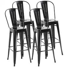 En effet on retrouve un mélange caractéristique de ce. Lot De 4 Tabourets De Bar Industriel Avec Dossier Hauteur Assise 76 5 Cm Metal Noir Tabouret Et Tabouret De Bar Salle A Manger Et Cuisine Meuble Gifi