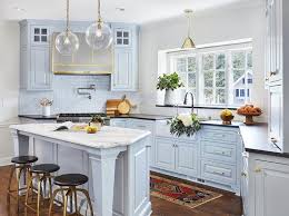 Gallery featuring images of kitchens with black appliances. Light Blue Angled Kitchen Island With Honed White Marble Countertop Transitional Kitchen