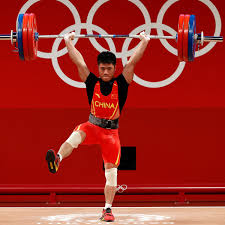 Women's weightlifting was included in the olympics just 21 years ago, making its debut in 2000 at the games in sydney. Don T Try This At Home China S Li Fabin Wins Weightlifting Gold With One Legged Lift Tokyo Olympic Games 2020 The Guardian