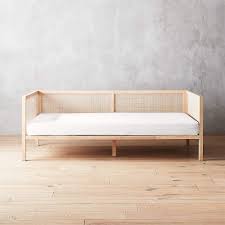 The linkspring is a rectangular metal frame (roughly the footprint of the mattress) with cross supports. Boho Natural Daybed With Pearl White Mattress Cover Reviews Cb2