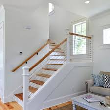 Homeadvisor's cable railing cost guide provides prices per linear foot for stainless steel cable, rails, and posts for decks and stairs. 75 Beautiful Farmhouse Cable Railing Staircase Pictures Ideas May 2021 Houzz