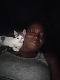 Does anybody have a grey and white cow cat?