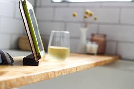 These simple tub trays keep your book, tablet, phone and drink above water so you can enjoy a relaxing soak. Diy Bathtub Tray Turn Your Bathroom Into A Spa Love Renovations