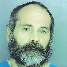 Police: Carbondale man illegally possesses a gun