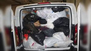 Police: Man stuffed U-Haul van with clothes stolen from donation bin in  Hamilton