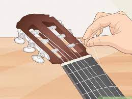 The strings are arranged from largest diameter to smallest diameter on the guitar. How To Change Classical Guitar Strings With Pictures Wikihow