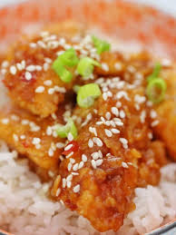 Whilst the oil is heating, place the egg in one shallow bowl and the cornflour in another shallow bowl. Sticky Sesame Chicken Mama Loves To Cook