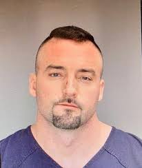 Holly man arrested after allegedly pointing gun at bar patrons, standoff  with police