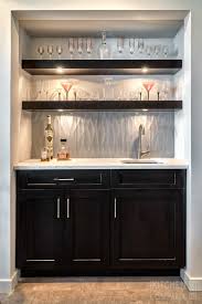 With open shelving and marble backsplash, this is another beautiful example of how to treat the range hood in a contemporary kitchen. Are Floating Shelves Right For Your Kitchen The Kitchen Company