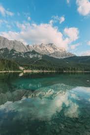 Zugspitze And Eibsee The Tallest Mountain And One Of The Most Beautiful Lakes In Germany Beautiful Lakes Lake Pictures Germany Photography