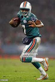 Quarter Back Cleo Lemon Of The Miami Dolphins Runs With The Ball Miami Dolphins Nfl Miami Dolphins Dolphins