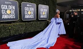 Well, my editor would likely cut at least 4,000 of those words if i even tried, so i'll be brief. Lady Gaga Goes Old School On Color Filled Golden Globes Red Carpet Egypttoday