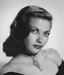 Yvonne DeCarlo was certainly one heck of a beauty. Love her gorgeous green  eyes. I think she should have been cast in better films, because she was  really good. I really loved