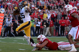 Iowa 56 Nebraska 14 Husked Black Heart Gold Pants