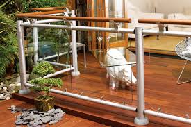 The traditional turned newel is replaced by a shorter length of the handrail material, the rails and newels are connected using a number of alloy handrail connecting brackets, which allow almost every configuration to be created. Fusion Handrail System Edecks