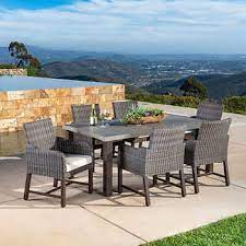 Crafted with rubberwood solids, this set is designed with a removable leaf and trumpet legs. Outdoor Patio Dining Sets Costco
