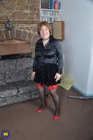 Chubby granny Janet Wilson strips to her nylon stockings and masturbates -  Pichunter