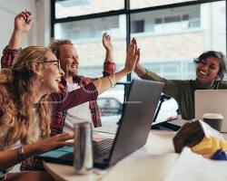Image of startup team celebrating success