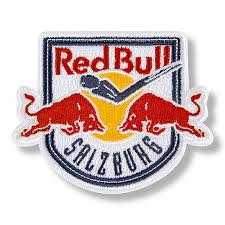 Kask z logo firmy w myśl sloganu: Ec Red Bull Salzburg Shop Ecs Logo Aufnaher Nur Hier Im Redbullshop Com