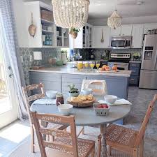 Glass dining tables a modern glass dining table helps make a smaller dining room feel bigger and is a great solution for highlighting a statement area rug placed beneath the table. Prepossessing Design Ideas For Boho Style Kitchens Boho Chic Style