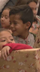 Khalid delivers Christmas gifts to Thomas Manor Elementary School students