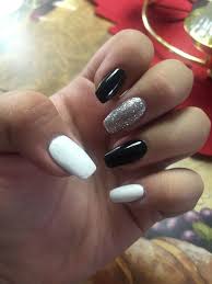 White coffin shaped acrylic nails with silver glitter accent nail. Coffin Nails Black White And Silver White And Silver Nails Silver Nails Fall Acrylic Nails