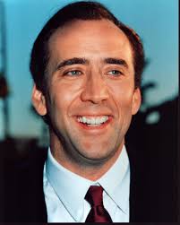 Nicholas Cage In Black Suit And Red Tie Photo Print (8 x 10)