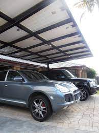 Carport Solar Panel Structure Cantilevered Steel Carport Doubles Up As A Solar Panel Structure Providing Enough Power For Th Solar Energy Solar Panels Solar