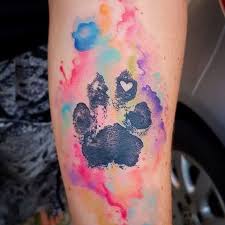 Unlike other tattoo styles, watercolor tattoos heavily feature bright and soft colors.when you try perfect 3 colors watercolor tattoo style of dog paw motive done by artist kenlar tattoo | post. Got To Do This Watercolour Pawprint Of Sam S Rescue Dog For Her An Awesome Tattoo For An Awesome Person Watercolor Watercolourtattoo Watercol ã‚¿ãƒˆã‚¥ãƒ¼ ãƒ‡ã‚¶ã‚¤ãƒ³