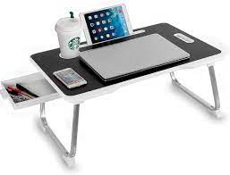 In just a few seconds, you can assemble your laptop desk into an incredibly sturdy stand that transforms any table or desk into a standing desk. Astory Laptop Bed Table Portable Laptop Desk Notebook Stand Reading Holder Breakfast Tray With Foldable Legs And Cup Slot Amazon De Computer Accessories