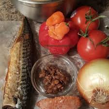 Combine the garlic, jalapeno, soy sauce and brown sugar and stir to dissolve, pour over the pork.(note: Locust Beans Concoction Rice