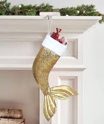 Beach themed christmas stockings are perfect when to hang from the mantle when you want to add coastal christmas decor to your home. Coastal Christmas Stockings Sand In Your Shoes Presents In Your Socks Seashell Madness