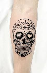 Sugar skull tattoos are very popular as body art designs. 30 Badass Skull Tattoos For Men Small Skull Tattoo Mexican Skull Tattoos Candy Skull Tattoo