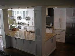 Has a broad selection of kitchen island legs in many styles, sizes, and wood types. View Of Kitchen From Stairs Best Kitchen Layout Kitchen Island With Columns Kitchen Island With Sink