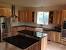 Grey Kitchen With Black Appliances