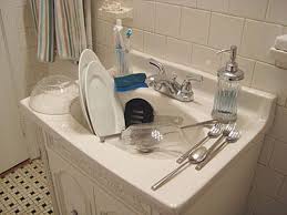 when washing the dishes in the kitchen