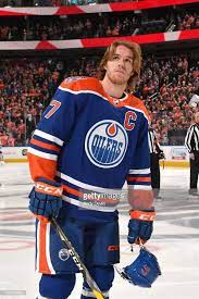 Come check out one of the most trusted names in hockey reporting. Connor Mcdavid Of The Edmonton Oilers Stands For The Singing Of The Connor Mcdavid Edmonton Oilers Edmonton Oilers Hockey