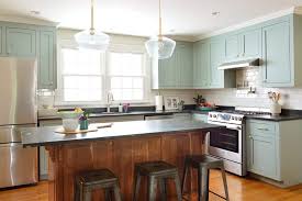 Transitional kitchen cabinets can be more traditional cabinet designs with modern hardware, or a kitchen with modern white cabinets also pair well with many popular styles, including farmhouse kitchen designs. A Big Kitchen Makeover Created From Little Changes Young House Love