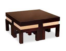 More than just a coffee table, this design also comes with four nesting stools featuring medium brown faux leather upholstery, a matching cappuccino finish, and a triangular design. S K Modern Art Pure Teak Wood Coffee Table Four Stool A Amazon In Furniture