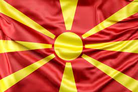 The flag of north macedonia is the national flag of the republic of north macedonia and depicts a stylized yellow sun on a red field, with eight broadening rays extending from the center to the edge of the field. Flag Respubliki Makedoniya Besplatno Foto