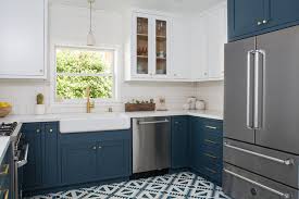 Dark blue kitchen cabinets with brass hardware. 6 Hardware Styles To Pair With Deep Blue Shaker Cabinets