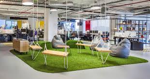 Design Detail This Red Bull Office Has A Casual Meeting Area With Swings Commercial Office Design Colorful Office Space Office Space
