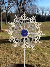 Dollar Store Snow Flake Glued To Driveway Reflector Cemetery Decorations Snow Decorations Grave Decorations
